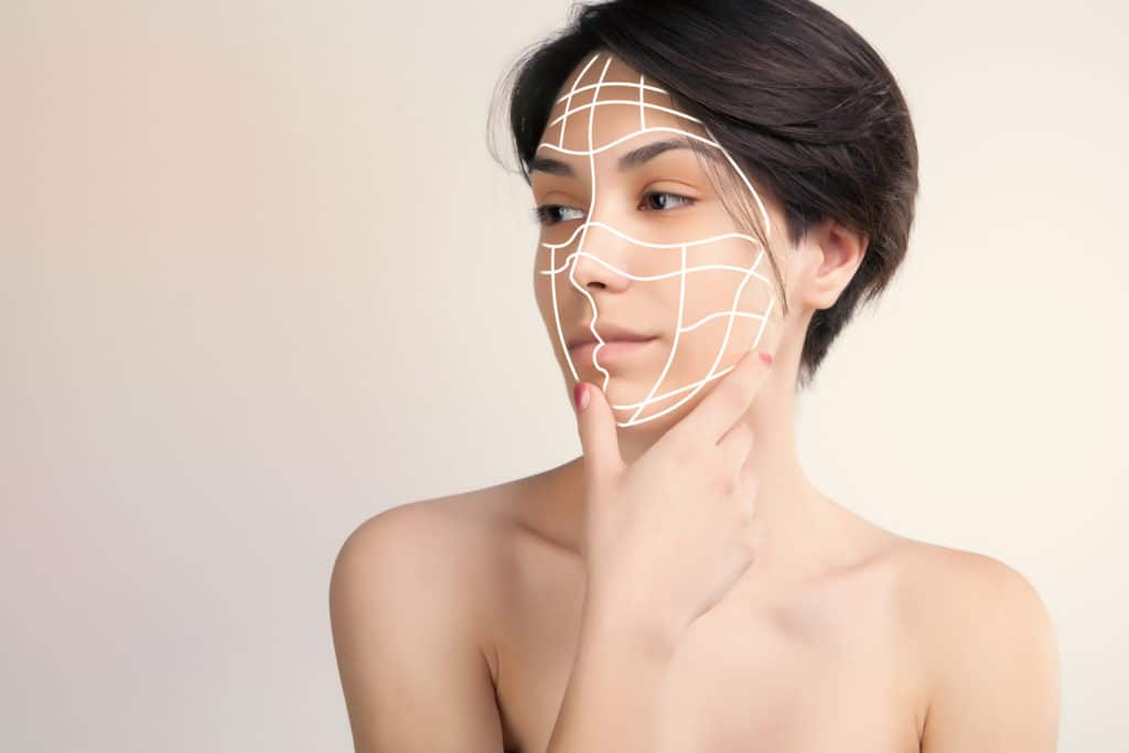 young asian model with surgery marks on her face